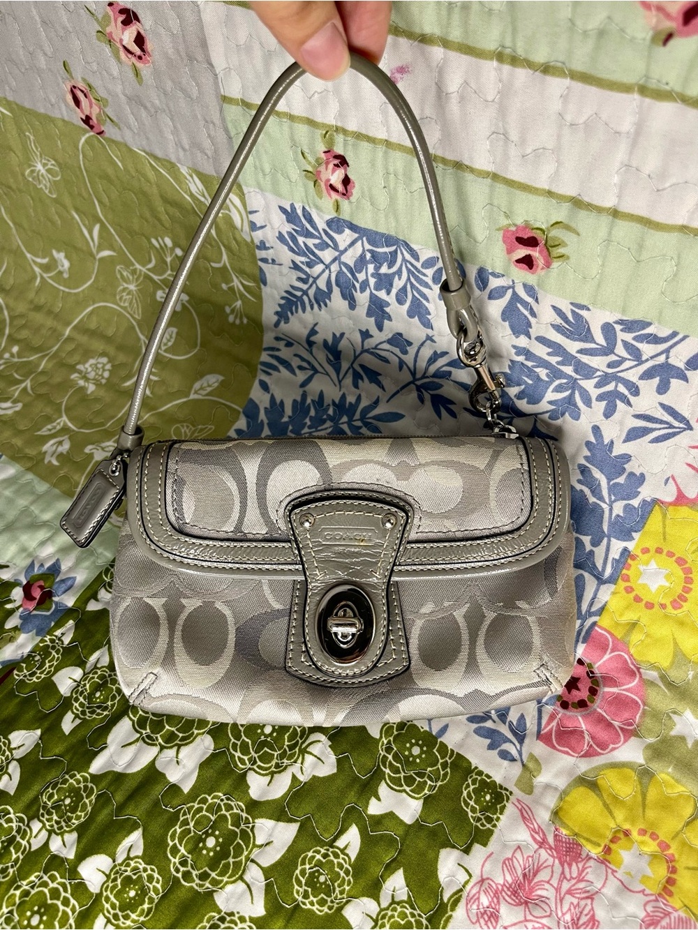 vintage coach silver optic turnlock wristlet